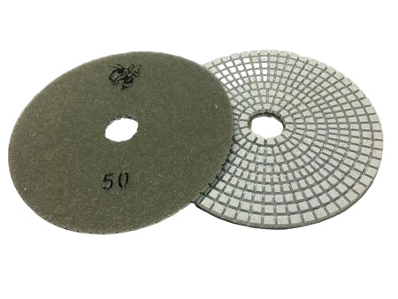 Two sanding discs on a white background