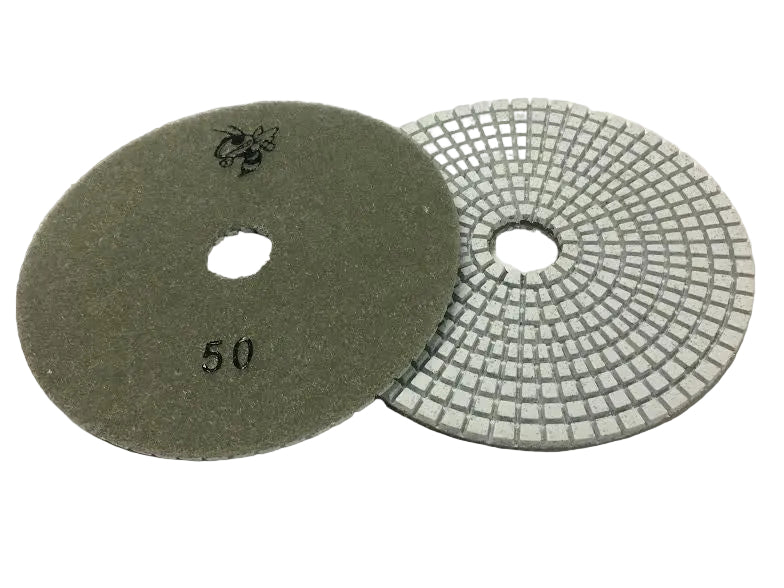 Two sanding discs on a white background